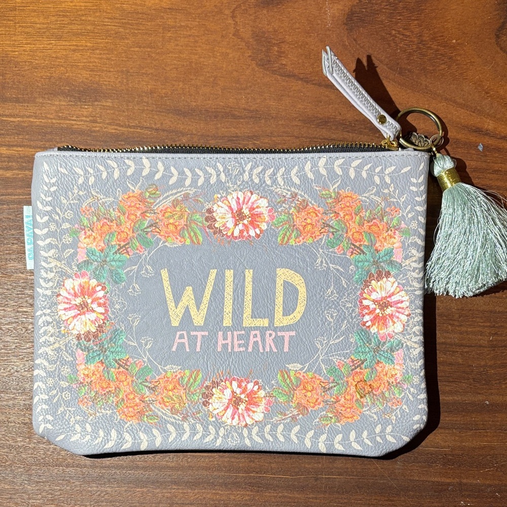 Papaya zippered tasseled pouch. Wild at heart